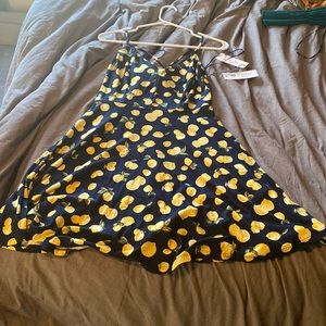 Sleeveless cross back navy blue lemon dress